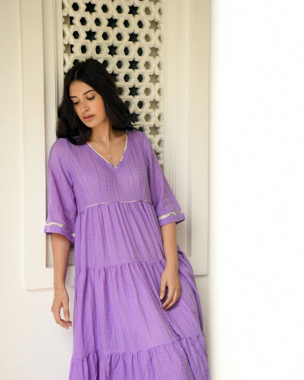 Purple Tiered Maxi Dress at Kamakhyaa by Taro. This item is Best Selling, Evening Wear, FB ADS JUNE, Handwoven cotton, July Sale, July Sale 2023, Natural, Purple, Regular Fit, Solids, Tiered Dresses, Wildflower Taro, Womenswear