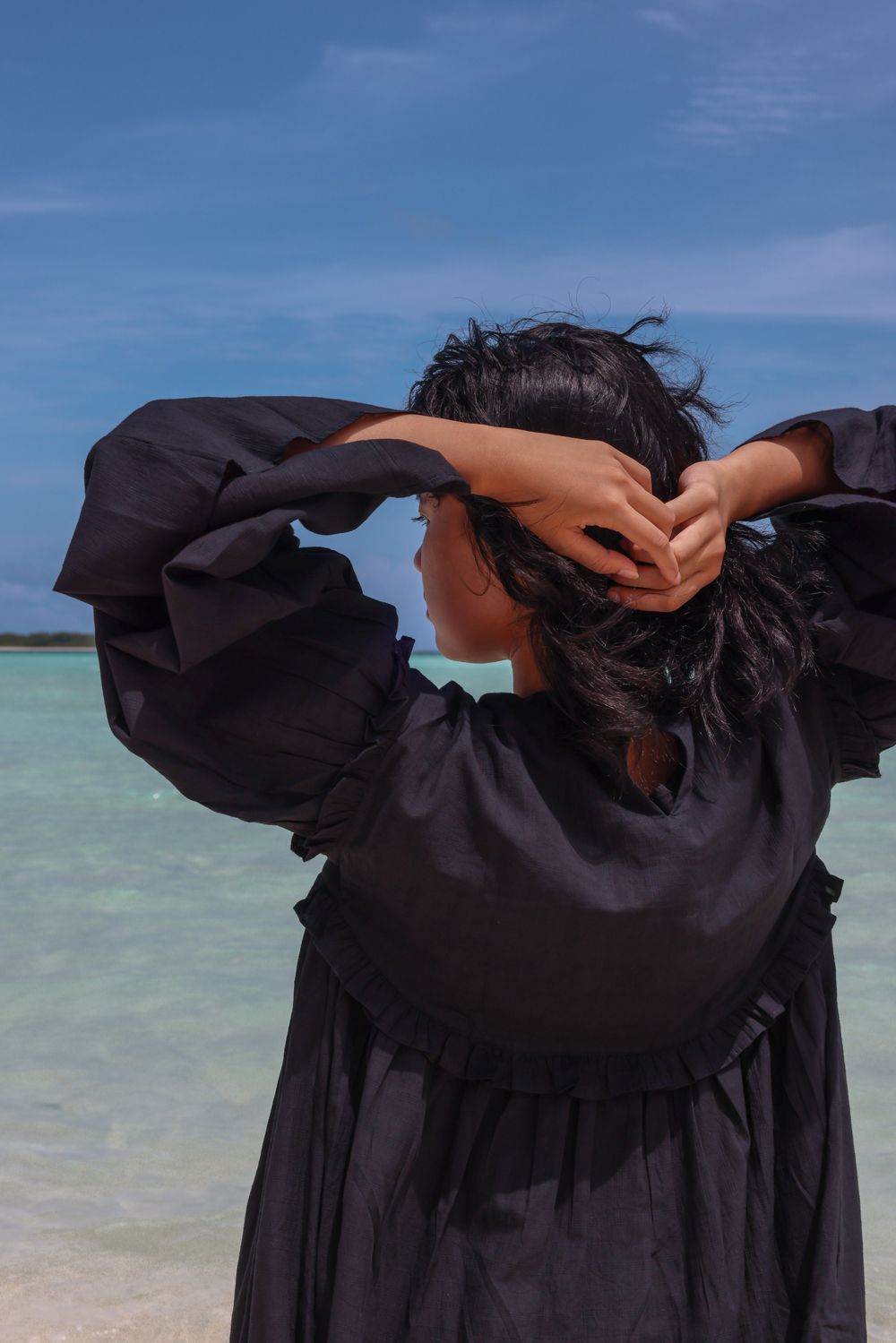 Recycled Cotton Black Solid Dress at Kamakhyaa by Raas. This item is Azo Free Dyes, Black, Cotton, Layla, Midi Dresses, Recycled, Relaxed Fit, Resort Wear, Solids, Womenswear