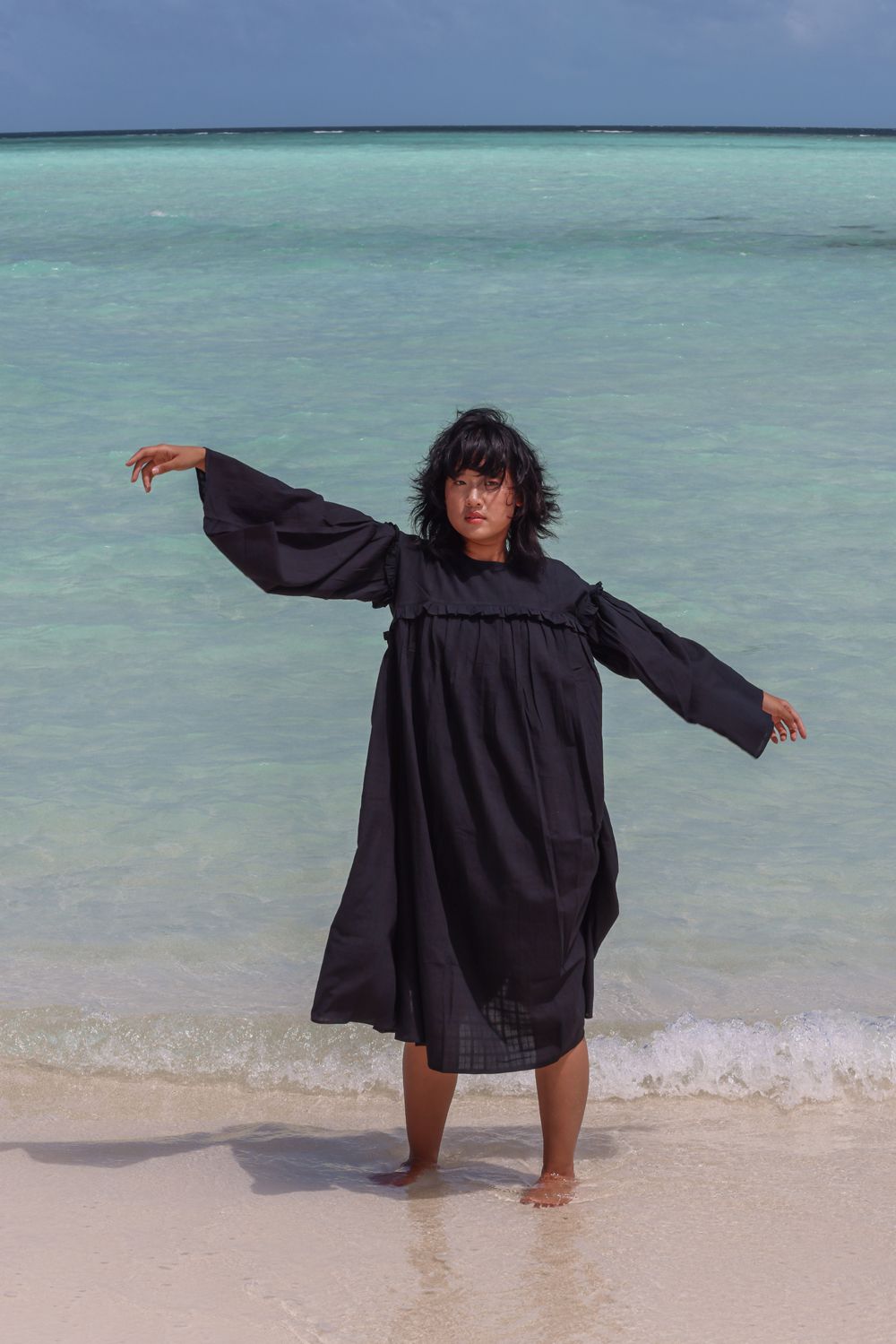 Recycled Cotton Black Solid Dress at Kamakhyaa by Raas. This item is Azo Free Dyes, Black, Cotton, Layla, Midi Dresses, Recycled, Relaxed Fit, Resort Wear, Solids, Womenswear