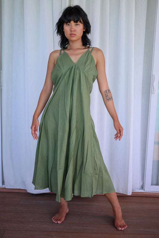 Recycled Cotton Green Sleeveless Dress at Kamakhyaa by Raas. This item is Azo Free Dyes, Cotton, Green, Layla, Midi Dresses, Recycled, Relaxed Fit, Resort Wear, Sleeveless Dresses, Solid Selfmade, Solids, Womenswear