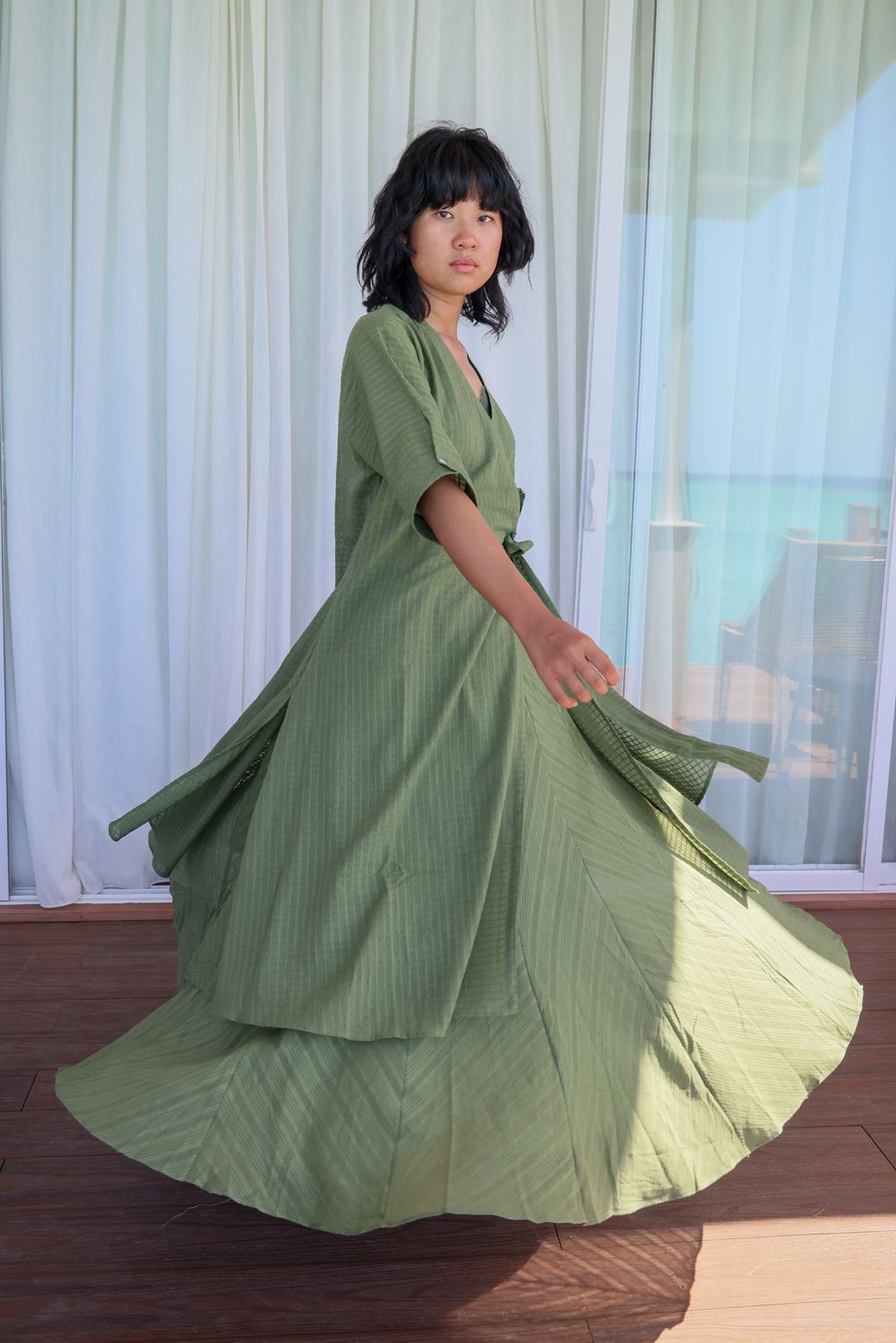 Recycled Cotton Green Solid Midi Dress at Kamakhyaa by Raas. This item is Azo Free Dyes, Casual Wear, Cotton, Green, Layla, Midi Dresses, Recycled, Relaxed Fit, Solids, Womenswear, Wrap Dresses