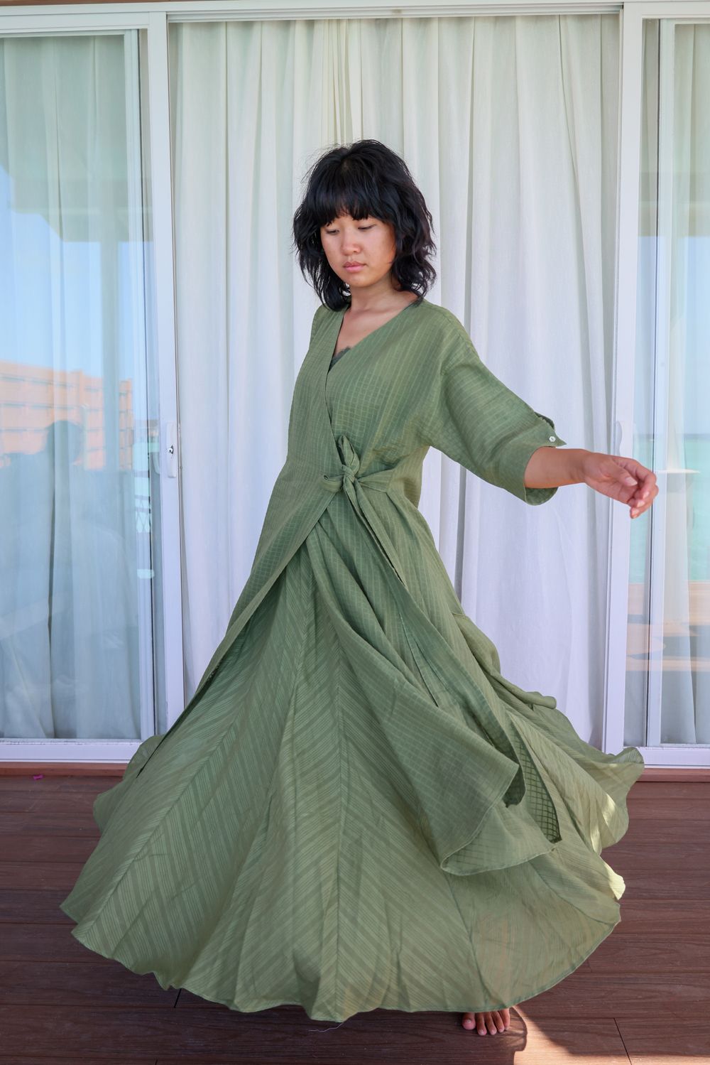 Recycled Cotton Green Solid Midi Dress at Kamakhyaa by Raas. This item is Azo Free Dyes, Casual Wear, Cotton, Green, Layla, Midi Dresses, Recycled, Relaxed Fit, Solids, Womenswear, Wrap Dresses