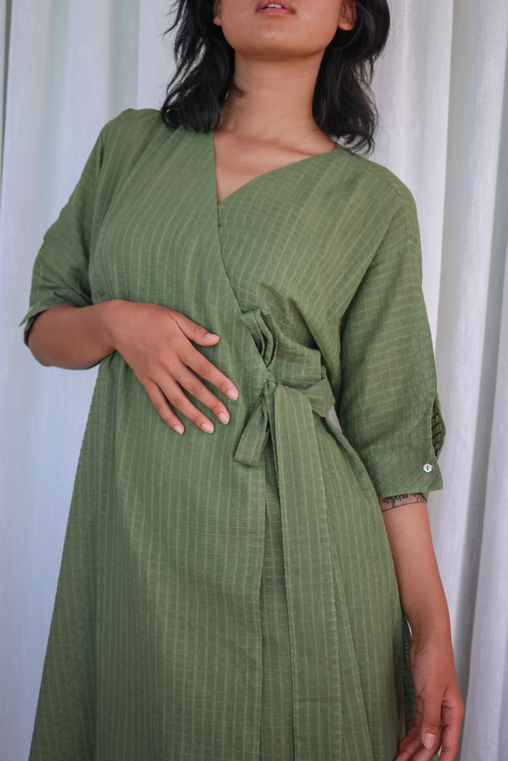 Recycled Cotton Green Solid Midi Dress at Kamakhyaa by Raas. This item is Azo Free Dyes, Casual Wear, Cotton, Green, Layla, Midi Dresses, Recycled, Relaxed Fit, Solids, Womenswear, Wrap Dresses