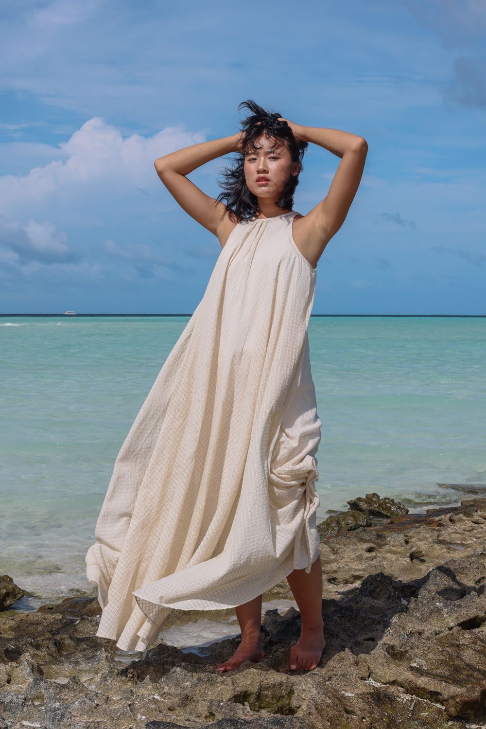 Recycled Cotton Off-White Sleeveless Dress at Kamakhyaa by Raas. This item is Azo Free Dyes, Cotton, Halter Neck Dresses, Layla, Maxi Dresses, Off-White, Recycled, Relaxed Fit, Resort Wear, Sleeveless Dresses, Solids, Womenswear