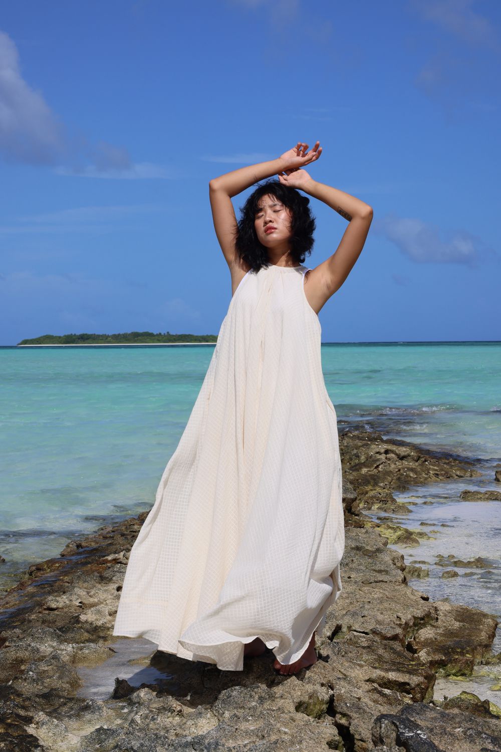 Recycled Cotton Off-White Sleeveless Dress at Kamakhyaa by Raas. This item is Azo Free Dyes, Cotton, Halter Neck Dresses, Layla, Maxi Dresses, Off-White, Recycled, Relaxed Fit, Resort Wear, Sleeveless Dresses, Solids, Womenswear