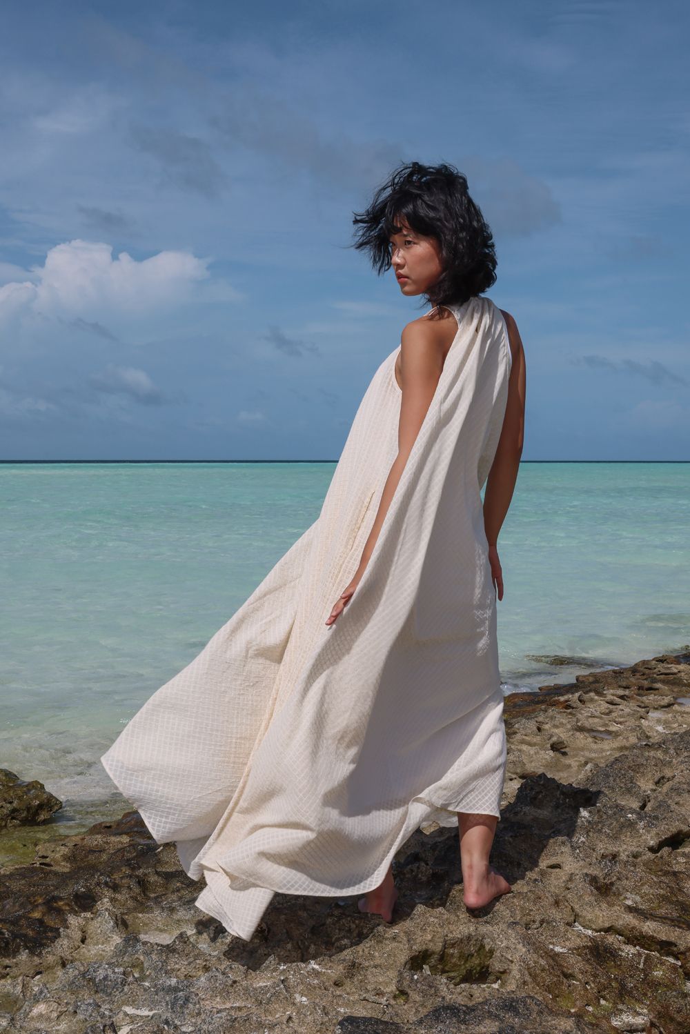 Recycled Cotton Off-White Sleeveless Dress at Kamakhyaa by Raas. This item is Azo Free Dyes, Cotton, Halter Neck Dresses, Layla, Maxi Dresses, Off-White, Recycled, Relaxed Fit, Resort Wear, Sleeveless Dresses, Solids, Womenswear