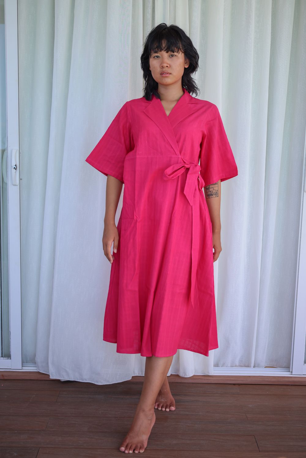 Recycled Cotton Pink Wrap Dress at Kamakhyaa by Raas. This item is Azo Free Dyes, Casual Wear, Cotton, Layla, Midi Dresses, Pink, Recycled, Relaxed Fit, Solids, Womenswear, Wrap Dresses