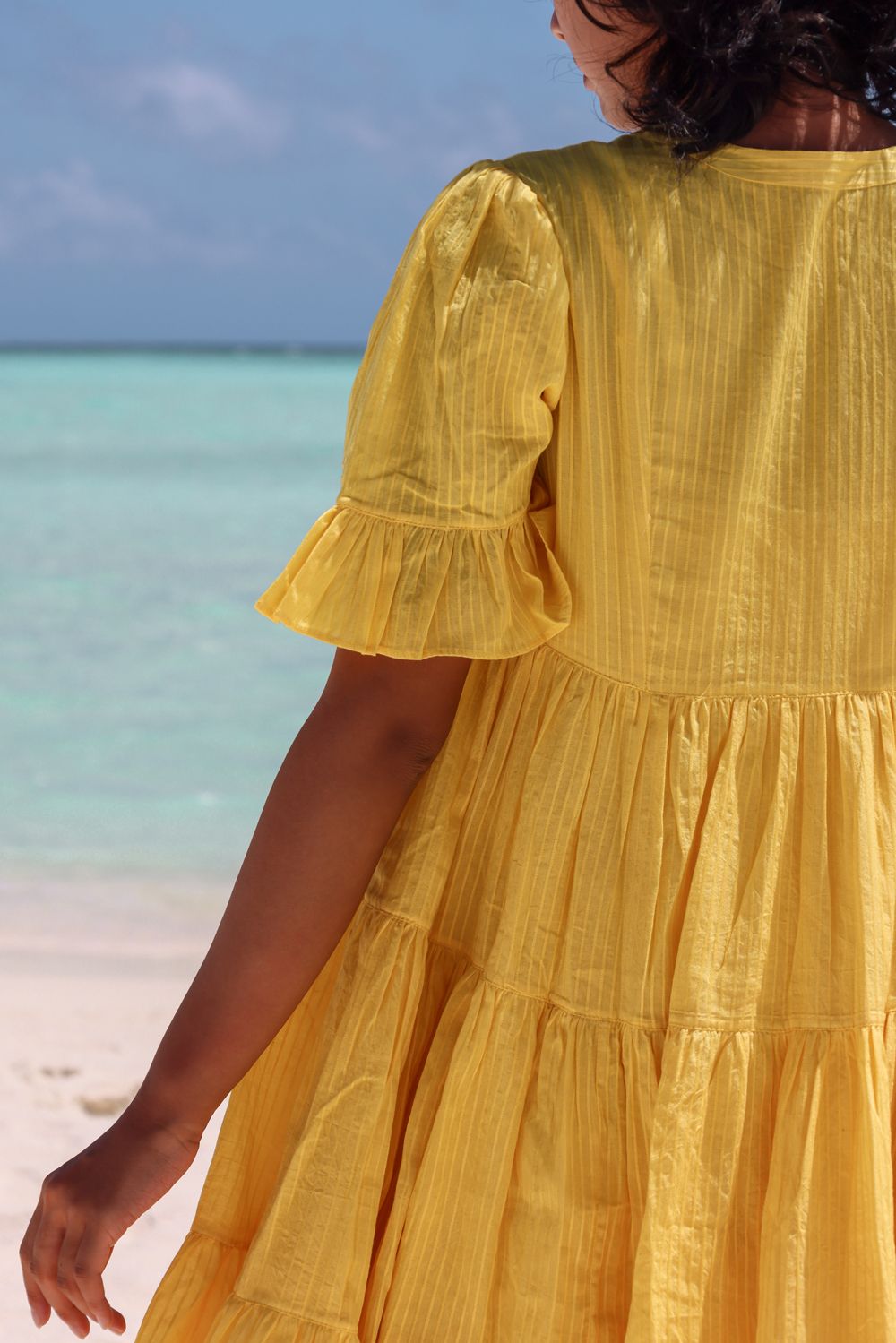 Recycled Cotton Yellow Tiered Dress at Kamakhyaa by Raas. This item is Azo Free Dyes, Cotton, Layla, Mini Dresses, Recycled, Relaxed Fit, Resort Wear, Solids, Tiered Dresses, Womenswear, Yellow