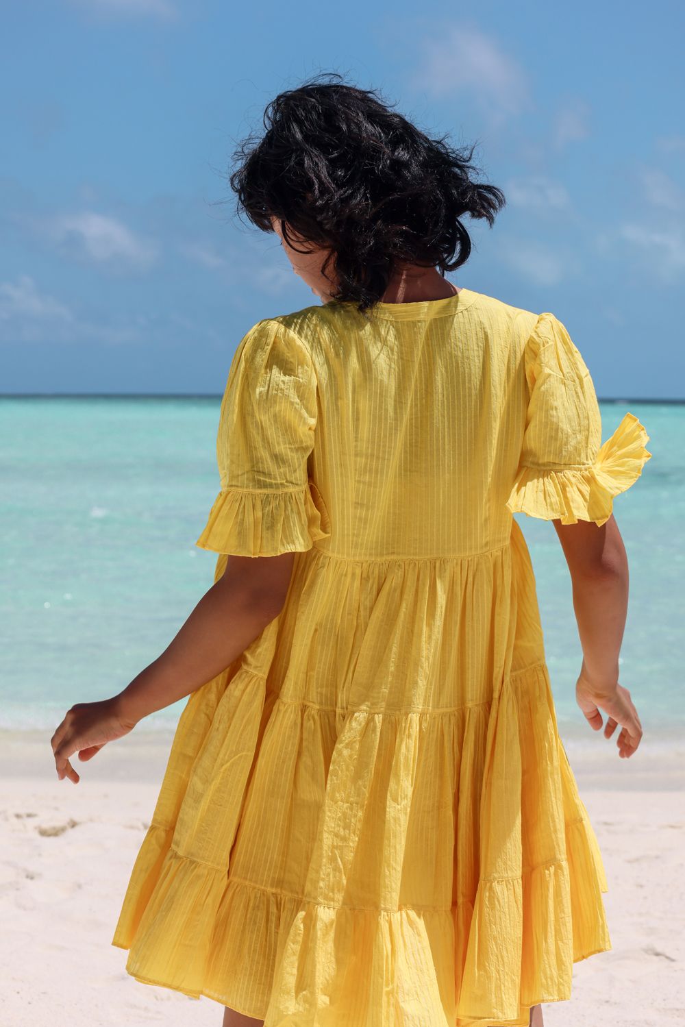 Recycled Cotton Yellow Tiered Dress at Kamakhyaa by Raas. This item is Azo Free Dyes, Cotton, Layla, Mini Dresses, Recycled, Relaxed Fit, Resort Wear, Solids, Tiered Dresses, Womenswear, Yellow