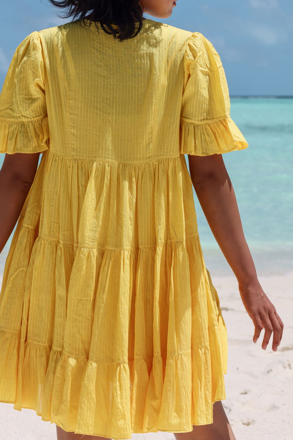 Recycled Cotton Yellow Tiered Dress at Kamakhyaa by Raas. This item is Azo Free Dyes, Cotton, Layla, Mini Dresses, Recycled, Relaxed Fit, Resort Wear, Solids, Tiered Dresses, Womenswear, Yellow