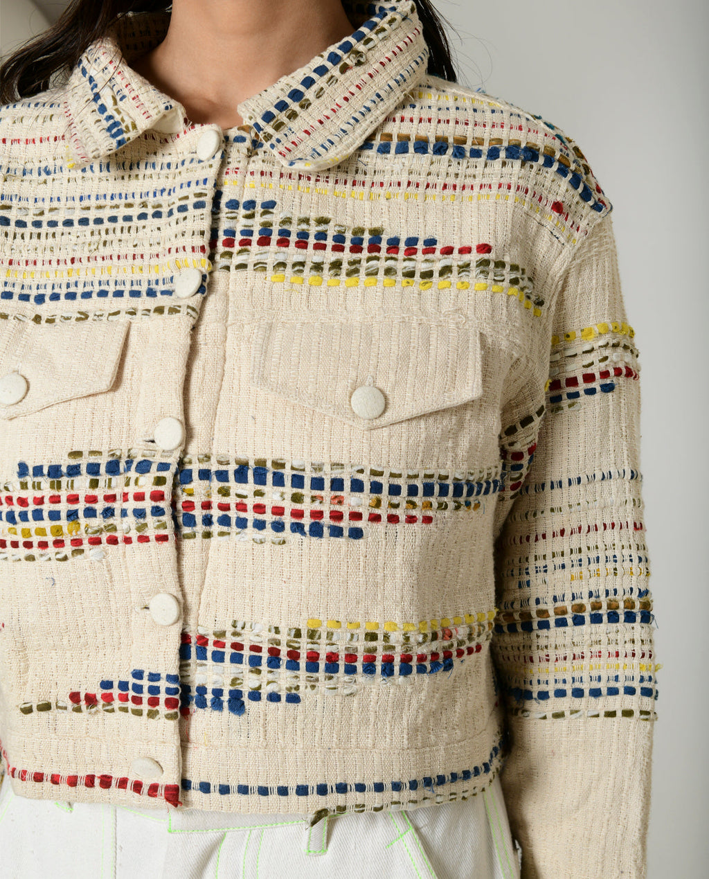 Recycled White Multi Colored Cropped Cotton Jacket at Kamakhyaa by Rias Jaipur. This item is 100% Cotton, Casual wear, Multicolor, Natural, RE 2.O, Regular, Stripes, Unisex, White, Womenswear