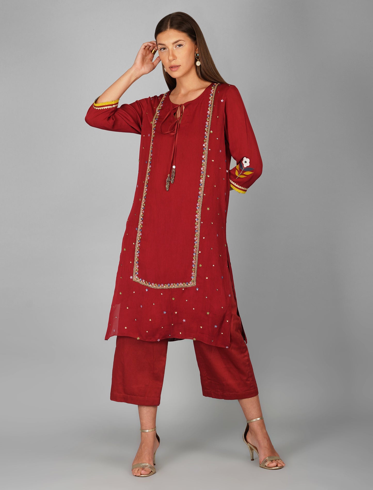 Red Appliqued Garnet Tunic Set at Kamakhyaa by Devyani Mehrotra. This item is Cotton, Embellished, Festive Wear, Kurta Pant Sets Pre Spring 2023, Natural, Office Wear Co-ords, Red, Regular Fit, Solids, Viscose, Womenswear
