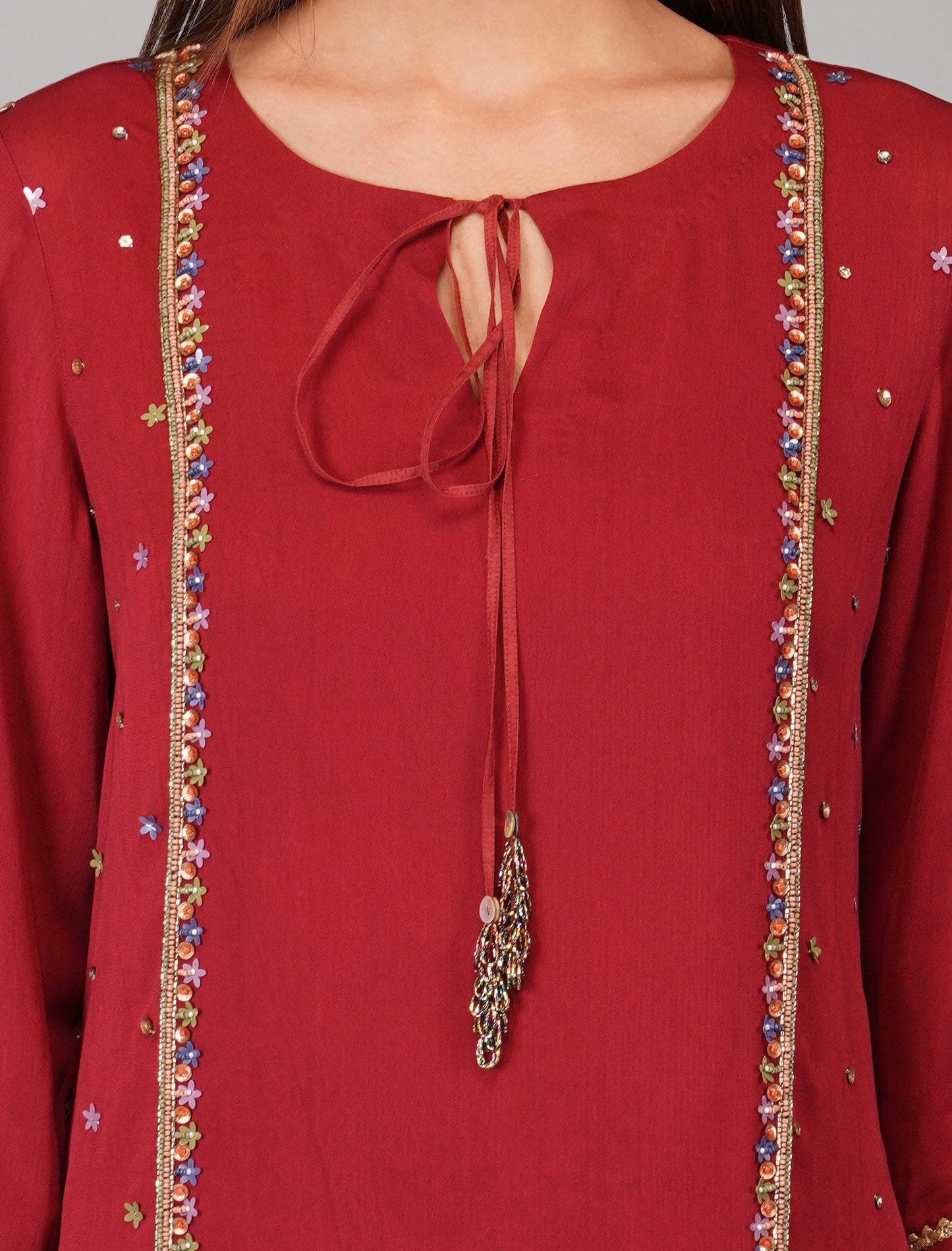 Red Appliqued Garnet Tunic Set at Kamakhyaa by Devyani Mehrotra. This item is Cotton, Embellished, Festive Wear, Kurta Pant Sets Pre Spring 2023, Natural, Office Wear Co-ords, Red, Regular Fit, Solids, Viscose, Womenswear