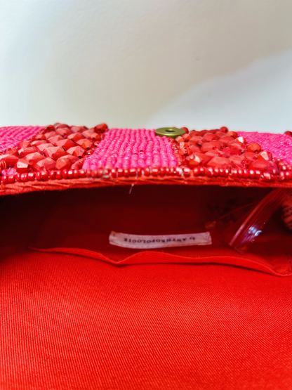 Red Beaded Sling Bag at Kamakhyaa by Pre Loved. This item is Bags, Casual Wear, Mirror Work, Multicolor, Natural, Sling Bags