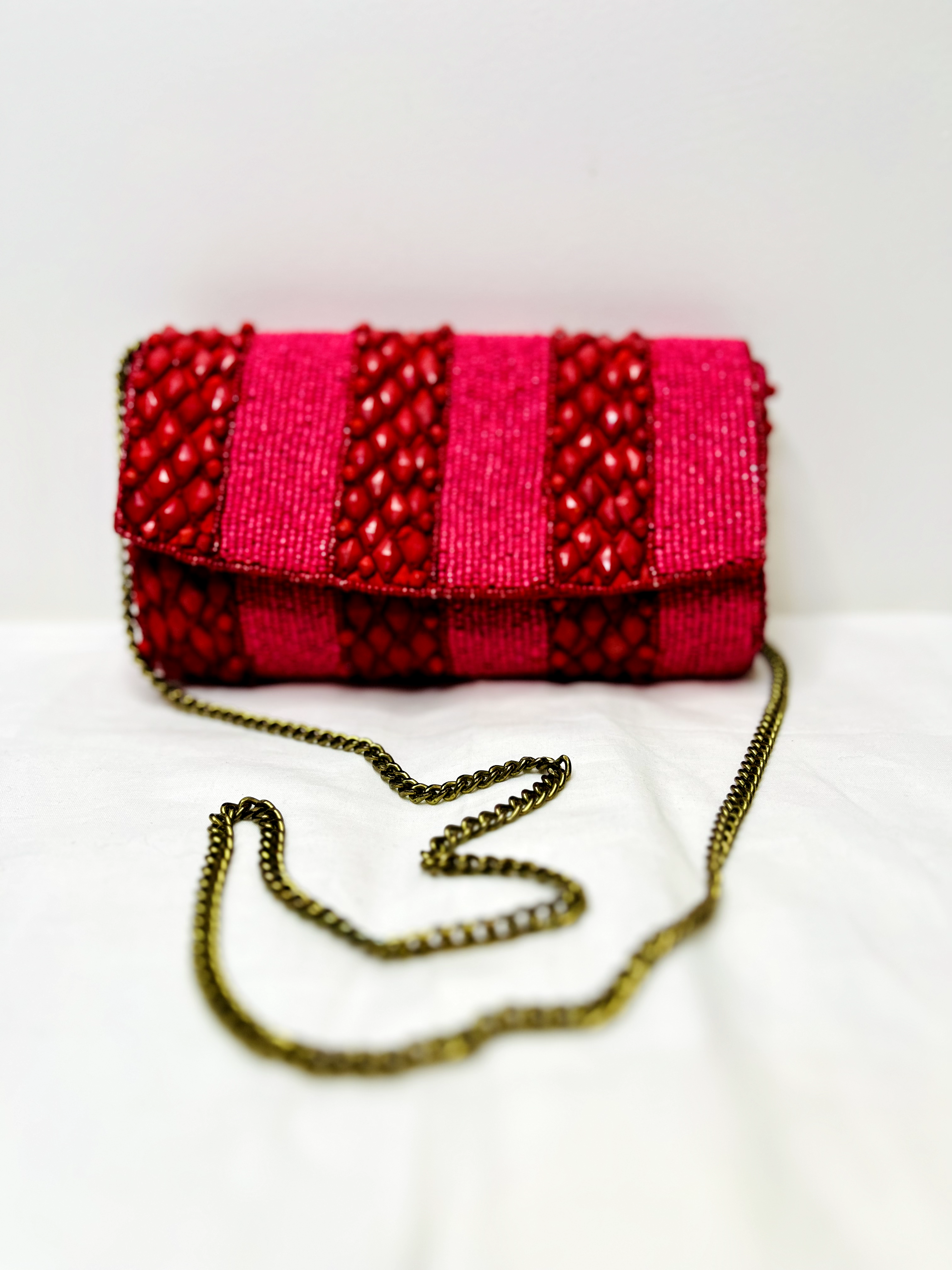 Red Beaded Sling Bag at Kamakhyaa by Pre Loved. This item is Bags, Casual Wear, Mirror Work, Multicolor, Natural, Sling Bags
