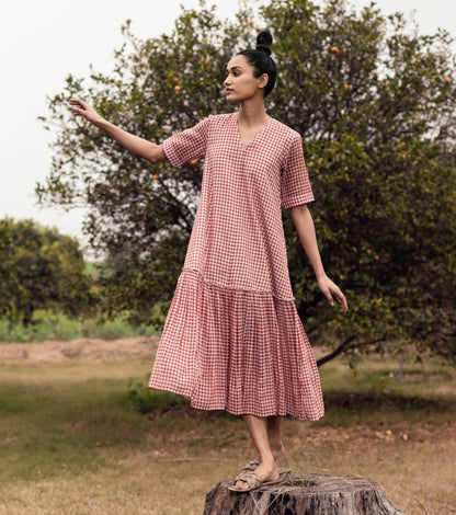 Red Check Midi Dress at Kamakhyaa by Khara Kapas. This item is Checks, Cotton, FB ADS JUNE, Lost & Found, Midi Dresses, Natural, Red, Regular Fit, Resort Wear, Solids, Tiered Dresses, Womenswear