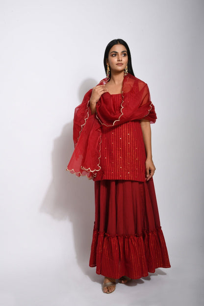 Red Cotton Kurta Skirt Set With Dupatta at Kamakhyaa by Taro. This item is Evening Wear, Handwoven cotton, Indian Wear, Indo-Western, July Sale, July Sale 2023, Lehenga Sets, Natural, Organza, Red, Regular Fit, Textured, Wedding Gifts, Womenswear