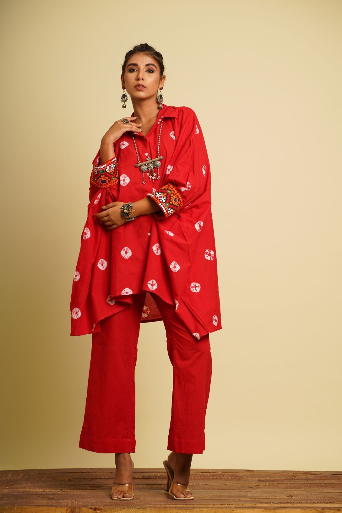 Red Embroidered Cotton Kaftan at Kamakhyaa by Keva. This item is 100% cotton, Fusion Wear, Kaftan Tops, Less than $50, Natural, New, Ombre & Dyes, Red, Relaxed Fit, Saba, Shirts, Womenswear