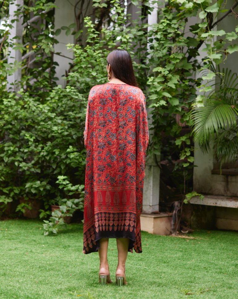 Red Floral Printed Silk Kaftan at Kamakhyaa by Mayura Kumar. This item is Ajrakh Heritage, Casual Wear, Dresses, Festive Wear, Kaftans, Mayura Kumar, Modal Silk, Prints, Red, Relaxed Fit, Womenswear