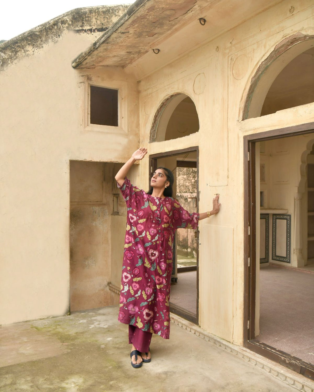 Red Kaftan With Pant at Kamakhyaa by Taro. This item is Beads, Best Selling, Chanderi Silk, Digital Print, Enchanted Garden, Evening Wear, Festive Wear, Handcrafted buttons, Indian Wear, July Sale, July Sale 2023, Kurta Pant Sets, Natural, Natural with azo free dyes, Red, Relaxed Fit, Sequin Work, Womenswear