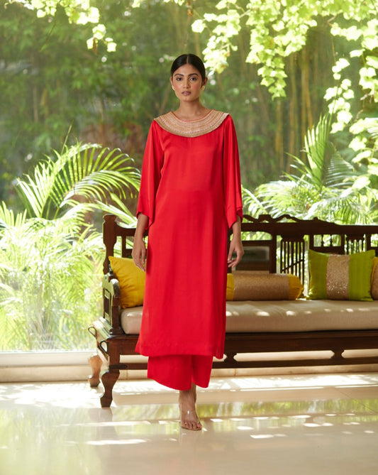 Red Satin Silk Kurta Pant Set at Kamakhyaa by Mayura Kumar. This item is Casual Wear, Festive Wear, Kurta Pant Sets, Mayura Kumar, Red, Regular Fit, Satin, Silk, Solids, Timeless Elegance, Womenswear