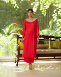 Red Satin Silk Kurta Pant Set at Kamakhyaa by Mayura Kumar. This item is Casual Wear, Festive Wear, Kurta Pant Sets, Mayura Kumar, Red, Regular Fit, Satin, Silk, Solids, Timeless Elegance, Womenswear