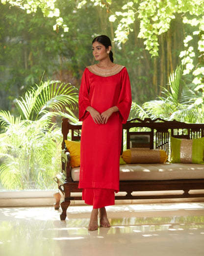 Red Satin Silk Kurta Pant Set at Kamakhyaa by Mayura Kumar. This item is Casual Wear, Festive Wear, Kurta Pant Sets, Mayura Kumar, Red, Regular Fit, Satin, Silk, Solids, Timeless Elegance, Womenswear