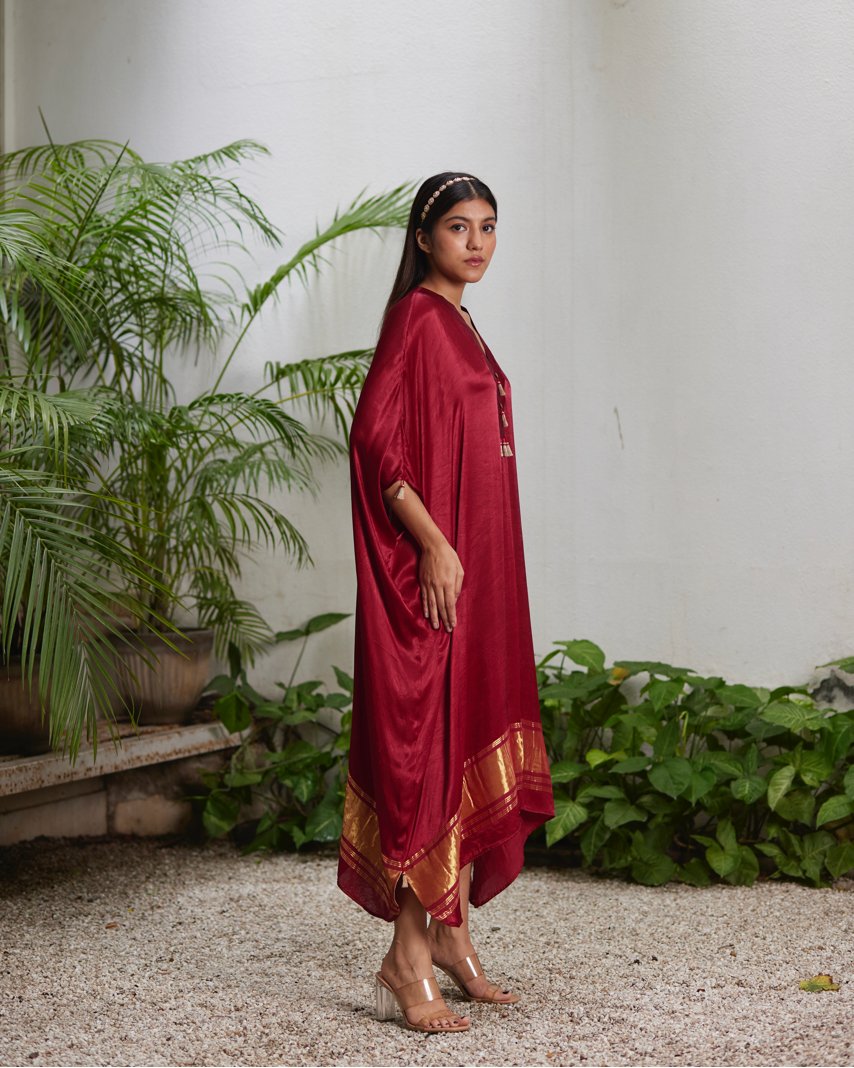 Red Silk Kaftan With Golden Border at Kamakhyaa by Mayura Kumar. This item is Ajrakh Heritage, Casual Wear, Dresses, Festive Wear, Kaftans, Mayura Kumar, Modal Silk, Red, Relaxed Fit, Solids, Womenswear