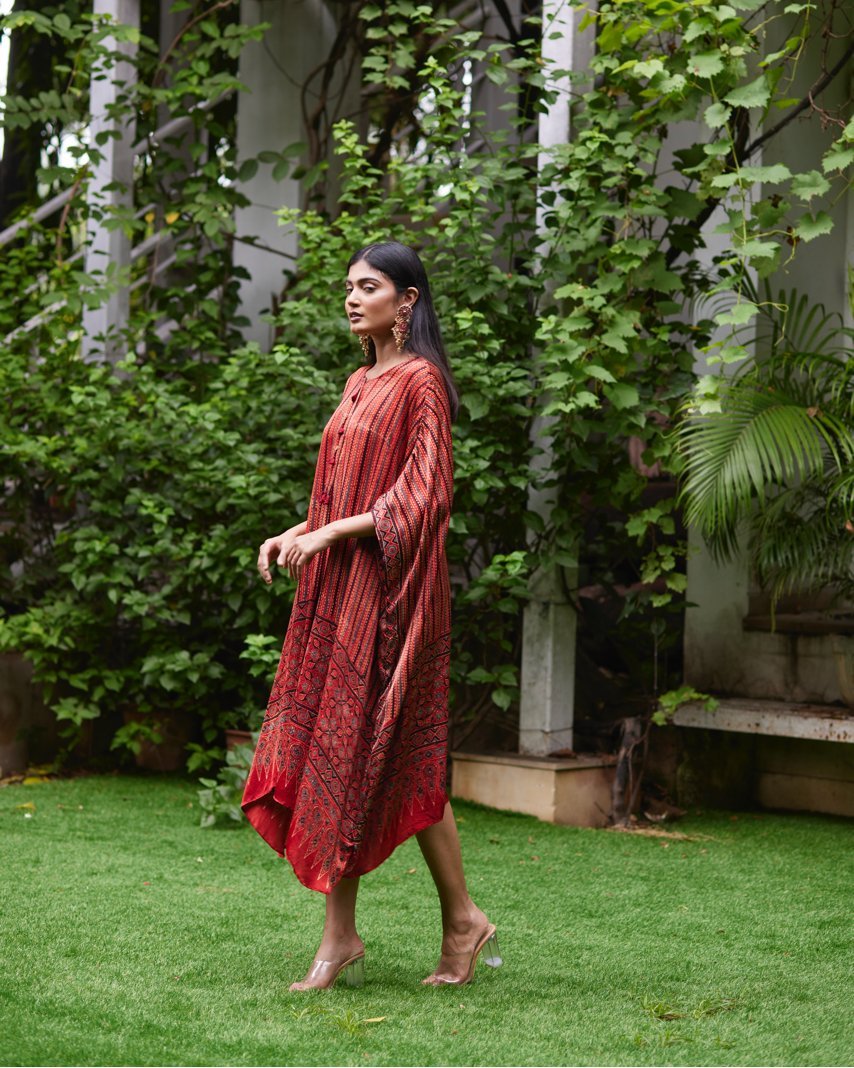 Red Striped Silk Kaftan at Kamakhyaa by Mayura Kumar. This item is Ajrakh Heritage, Casual Wear, Dresses, Festive Wear, Kaftans, Mayura Kumar, Natural, Prints, Red, Relaxed Fit, Stripes, Womenswear