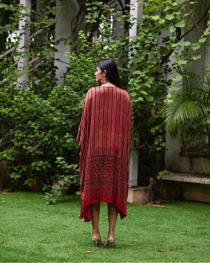 Red Striped Silk Kaftan at Kamakhyaa by Mayura Kumar. This item is Ajrakh Heritage, Casual Wear, Dresses, Festive Wear, Kaftans, Mayura Kumar, Natural, Prints, Red, Relaxed Fit, Stripes, Womenswear