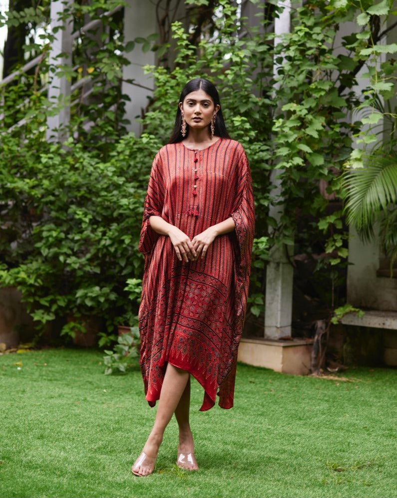 Red Striped Silk Kaftan at Kamakhyaa by Mayura Kumar. This item is Ajrakh Heritage, Casual Wear, Dresses, Festive Wear, Kaftans, Mayura Kumar, Natural, Prints, Red, Relaxed Fit, Stripes, Womenswear