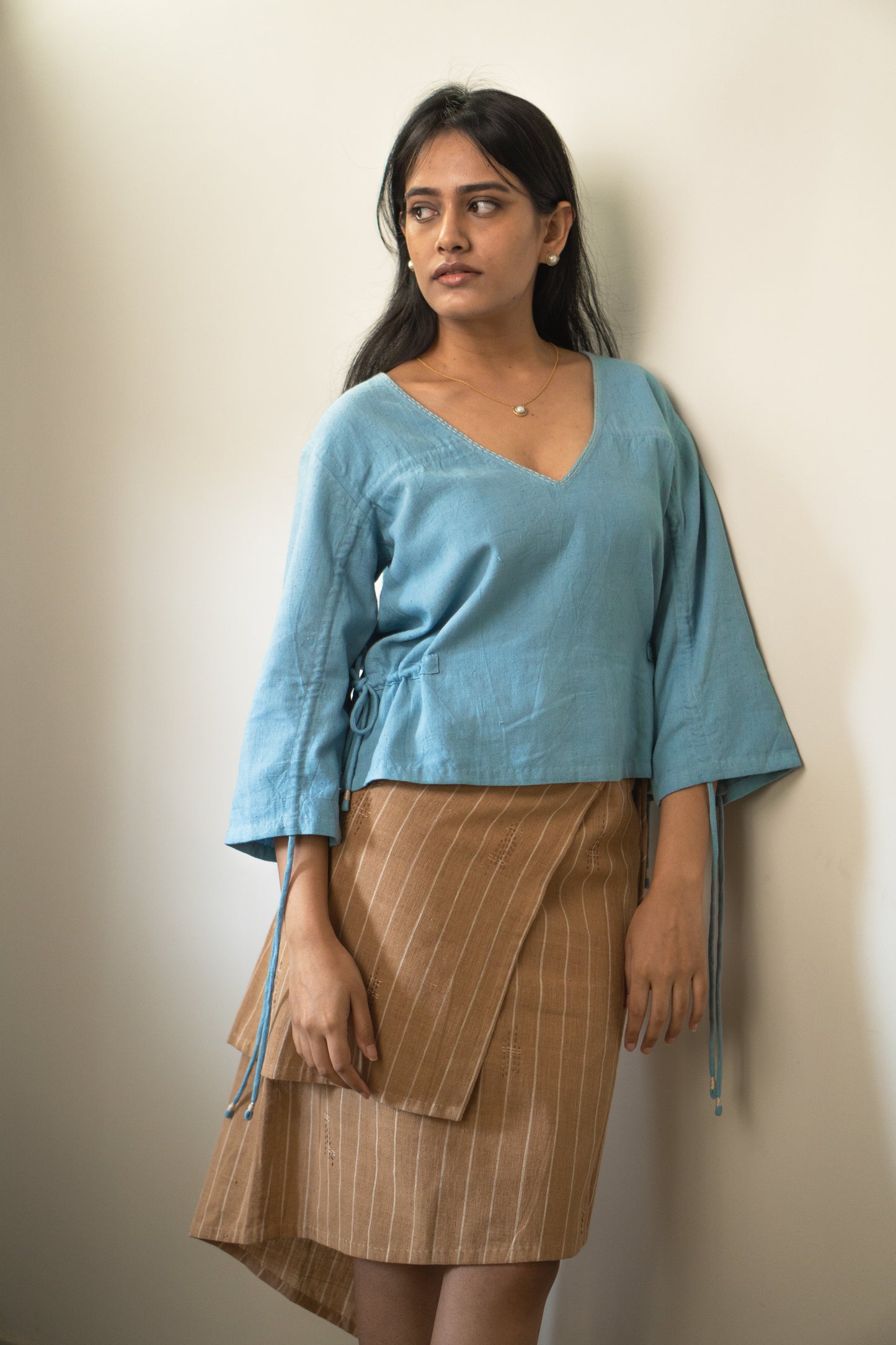 Reversible Ruched Blouse at Kamakhyaa by Lafaani. This item is 100% pure cotton, Blouses, Casual Wear, Light Blue, Materiality, Natural with azo free dyes, Organic, Regular Fit, Reversible, Solids, Womenswear
