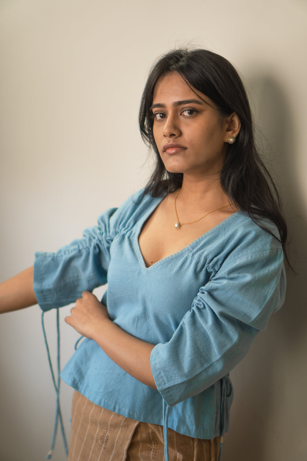 Reversible Ruched Blouse at Kamakhyaa by Lafaani. This item is 100% pure cotton, Blouses, Casual Wear, Light Blue, Materiality, Natural with azo free dyes, Organic, Regular Fit, Reversible, Solids, Womenswear