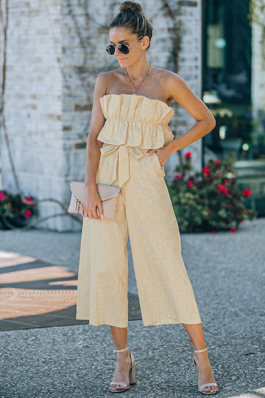 Ruffled Strapless Wide Leg Jumpsuit at Kamakhyaa by Trendsi. This item is 100% cotton, Casual Wear, Jumpsuits, Natural, Regular Fit, Ship From Overseas, Solids, Trendsi, Womenswear