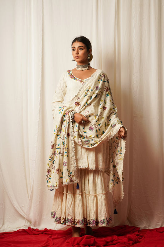 Sharara Set With Cotton Duppata - Set Of Three at Kamakhyaa by Keva. This item is Best Selling, Cotton Lurex, Embroidered, Indian Wear, Natural, Relaxed Fit, Resort Wear, Sharara Sets, Shararas, Tatriz, Wedding Gifts, White, Womenswear