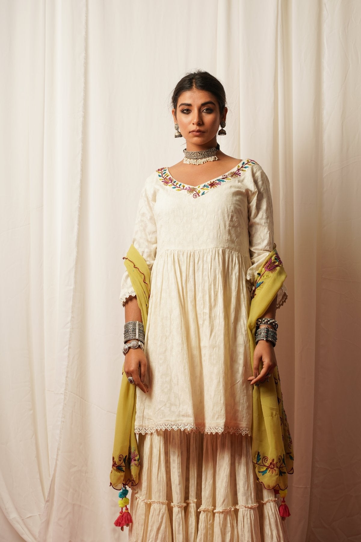 Sharara Set With Green Duppata - Set Of Three at Kamakhyaa by Keva. This item is Best Selling, Cotton Lurex, Embroidered, Green, Indian Wear, Natural, Relaxed Fit, Resort Wear, Sharara Sets, Shararas, Tatriz, Wedding Gifts, White, Womenswear