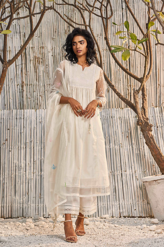 Shell White Chanderi Gathered Kurta with Pant - Set of 2 at Kamakhyaa by Charkhee. This item is Cotton, Cotton Satin, Dobby Cotton, Festive Wear, Indian Wear, Kurta Pant Sets, Natural, Organza, Regular Fit, Shores 23, Solids, Wedding Gifts, White, Womenswear