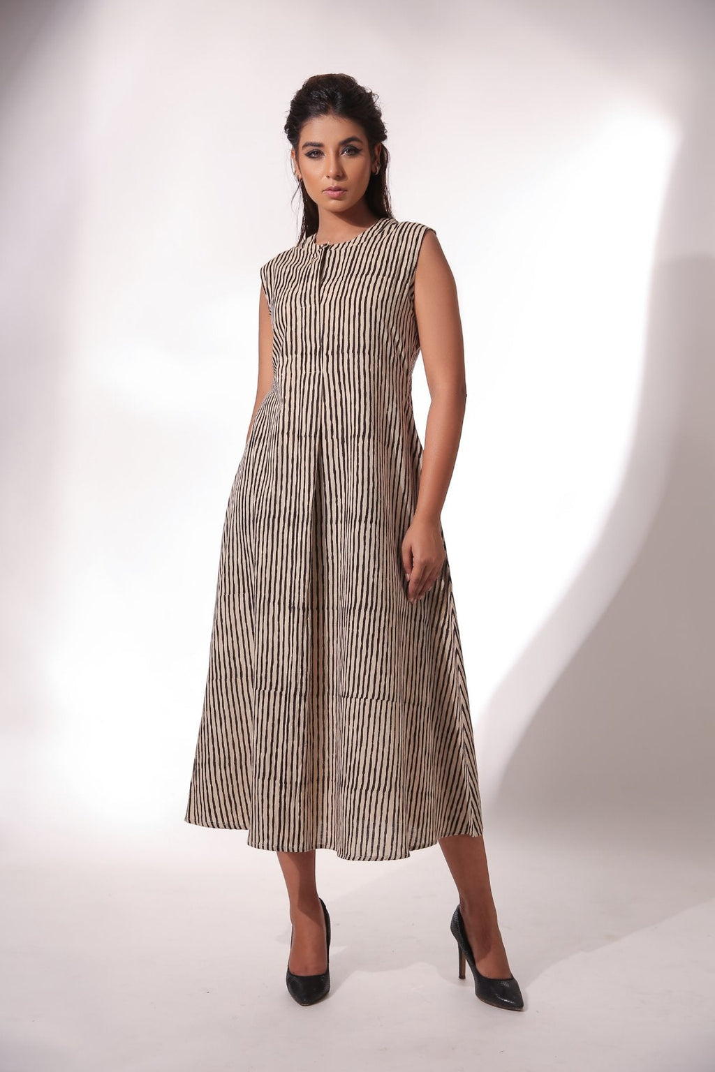 Sleeveless Midi Dress With Cape at Kamakhyaa by Keva. This item is Beige, Best Selling, Black, Block Prints, Cape, Co-ord Sets, Cotton, Dress Sets, Natural, Relaxed Fit, Resort Wear, Womenswear, Zima