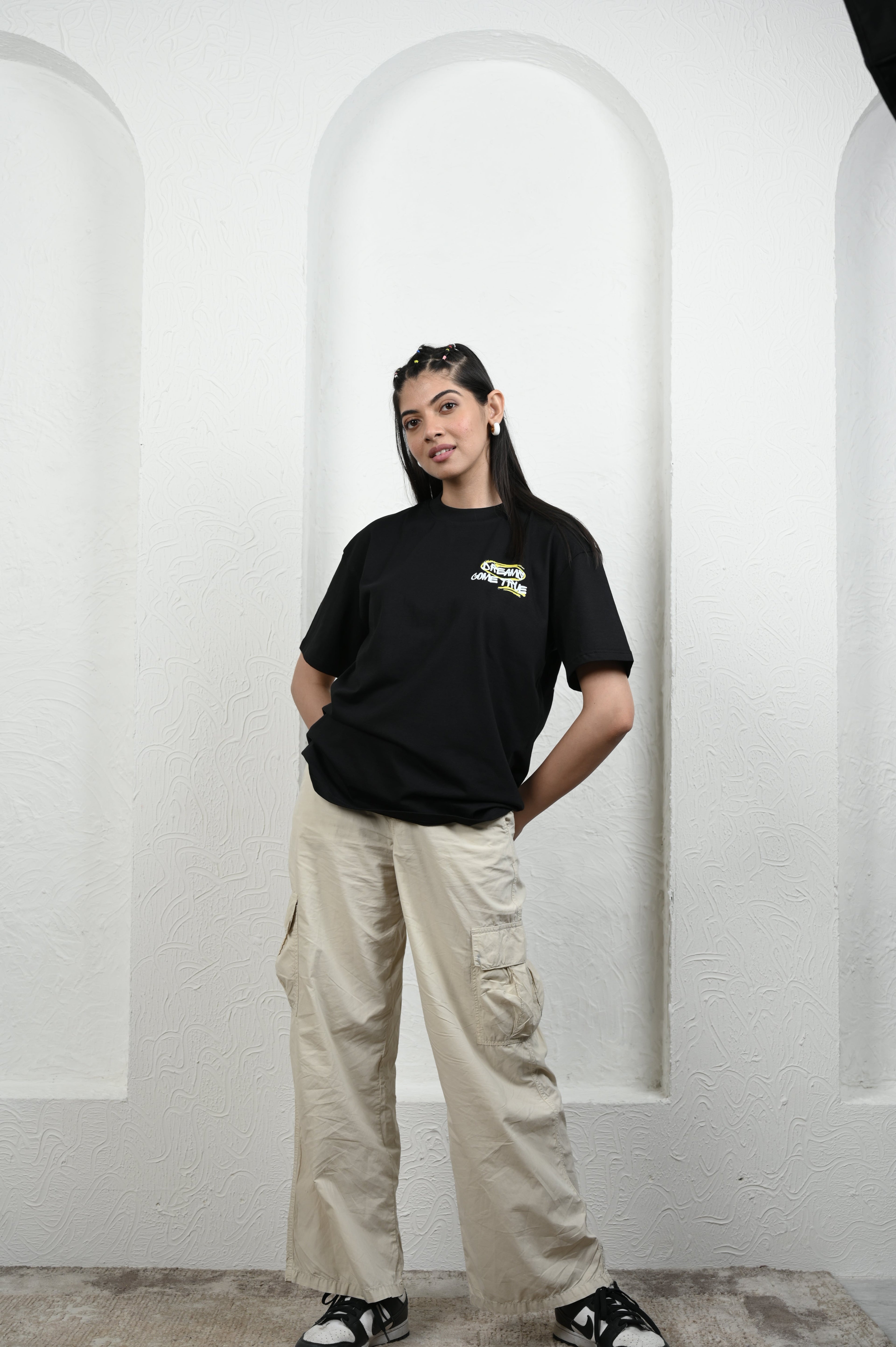 Smile Please 100% Cotton Oversized Black T-shirt at Kamakhyaa by Unfussy. This item is 100% cotton, Black, Casual Wear, Organic, Oversized Fit, Printed, T-Shirts, Unfussy, Unisex, Womenswear