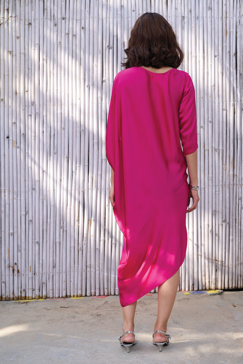 Solid Asymmetric Drape Dress at Kamakhyaa by Kanelle. This item is Dresses, Festive Wear, Hand Embroidered, Midi Dresses, Natural, Partywear Co-ords, Pink, Rang, Regular Fit, Solid, Viscose Satin, Womenswear