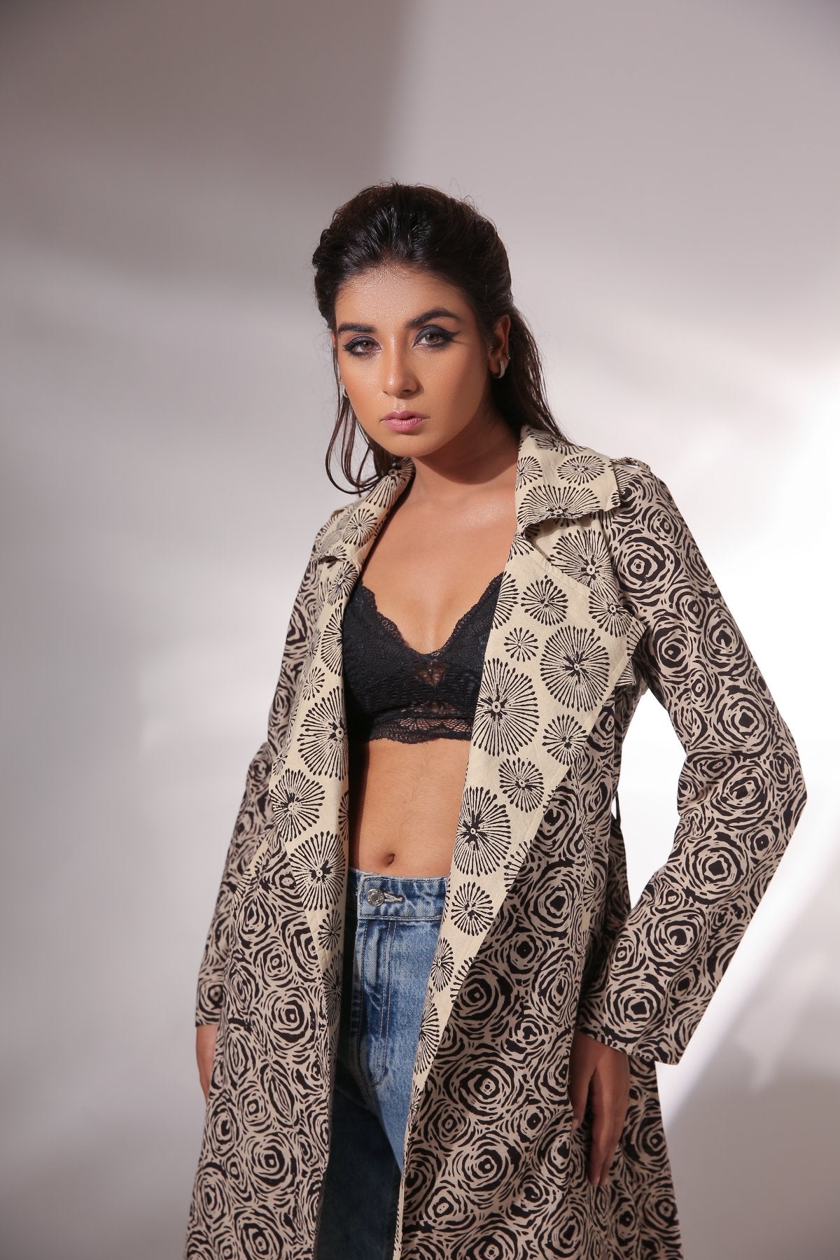 Spiral Hand Block Printed Trench Coat at Kamakhyaa by Keva. This item is Beige, Best Selling, Black, Block Prints, Cotton, Natural, Relaxed Fit, Resort Wear, Spirals, Trench Coats, Womenswear, Zima