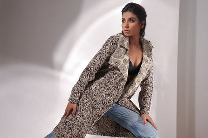 Spiral Hand Block Printed Trench Coat at Kamakhyaa by Keva. This item is Beige, Best Selling, Black, Block Prints, Cotton, Natural, Relaxed Fit, Resort Wear, Spirals, Trench Coats, Womenswear, Zima