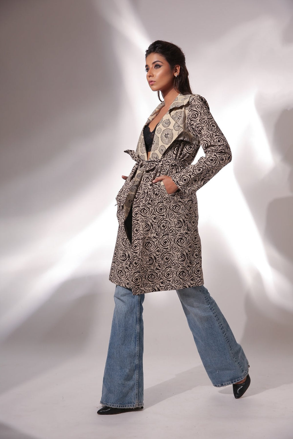 Spiral Hand Block Printed Trench Coat at Kamakhyaa by Keva. This item is Beige, Best Selling, Black, Block Prints, Cotton, Natural, Relaxed Fit, Resort Wear, Spirals, Trench Coats, Womenswear, Zima