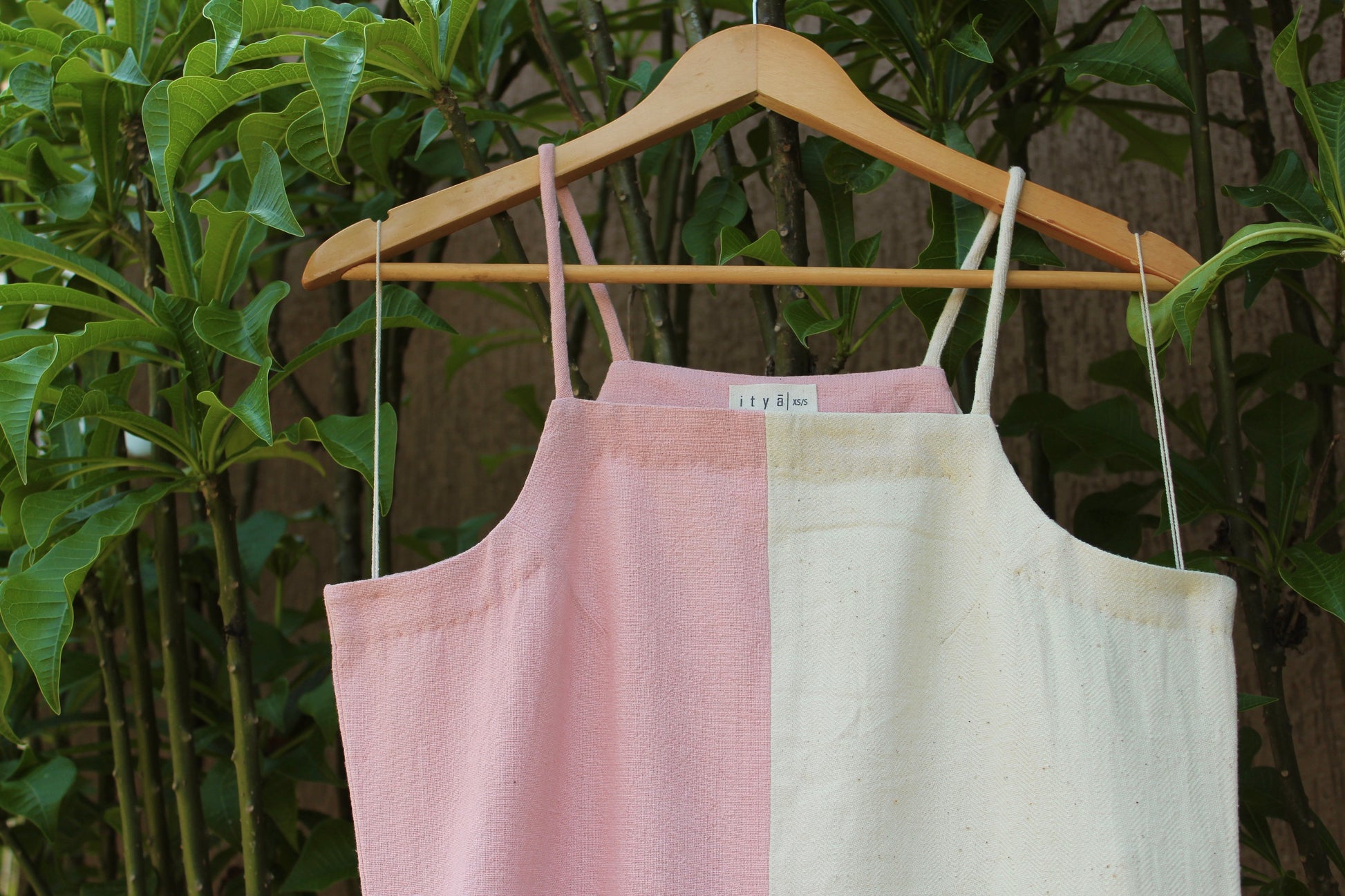 Tansi Slip Dress at Kamakhyaa by Itya. This item is Casual Wear, Hand Spun Cotton, Handwoven cotton, Midi Dresses, Natural, Pastel Perfect, Pastel Perfect by Itya, Pink, Plant Dye, Regular Fit, Sleeveless Dresses, Solids, SS22, Womenswear