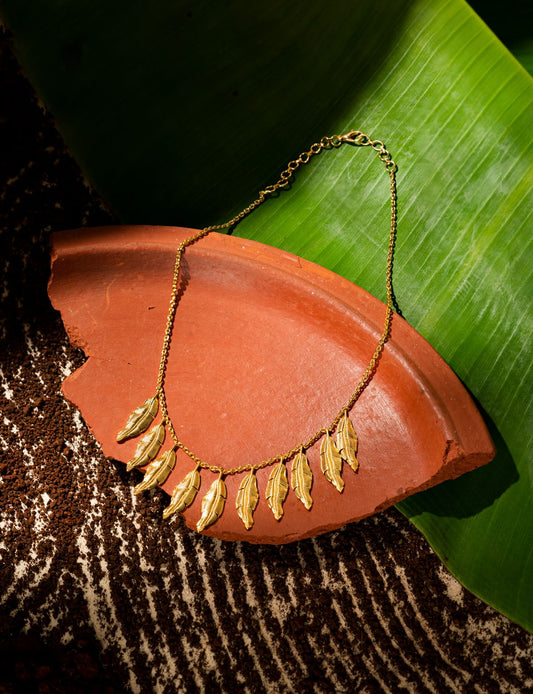 The Golden Leaf Necklace at Kamakhyaa by Amalgam By Aishwarya. This item is Brass dipped in gold, Eating to Existance, Fashion Jewellery, Free Size, Gold, jewelry, Natural, Necklaces, Solids
