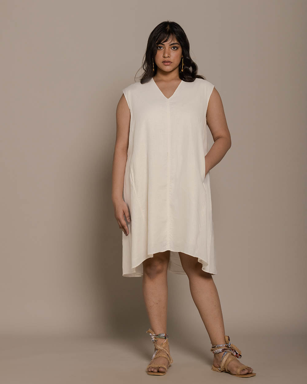 The Musical Dusk Dress - Shell Off White at Kamakhyaa by Reistor. This item is Best Selling, Casual Wear, Hemp, Mini Dresses, Natural, Sleeveless Dresses, Solids, White, Womenswear