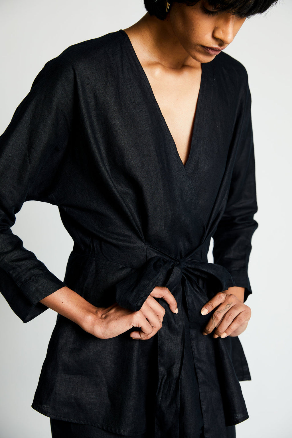 The Power Moves Wrap top at Kamakhyaa by Reistor. This item is Black, Casual Wear, Hemp, Natural, Noir, Regular Fit, Solids, Tops, Womenswear, Wrap Tops