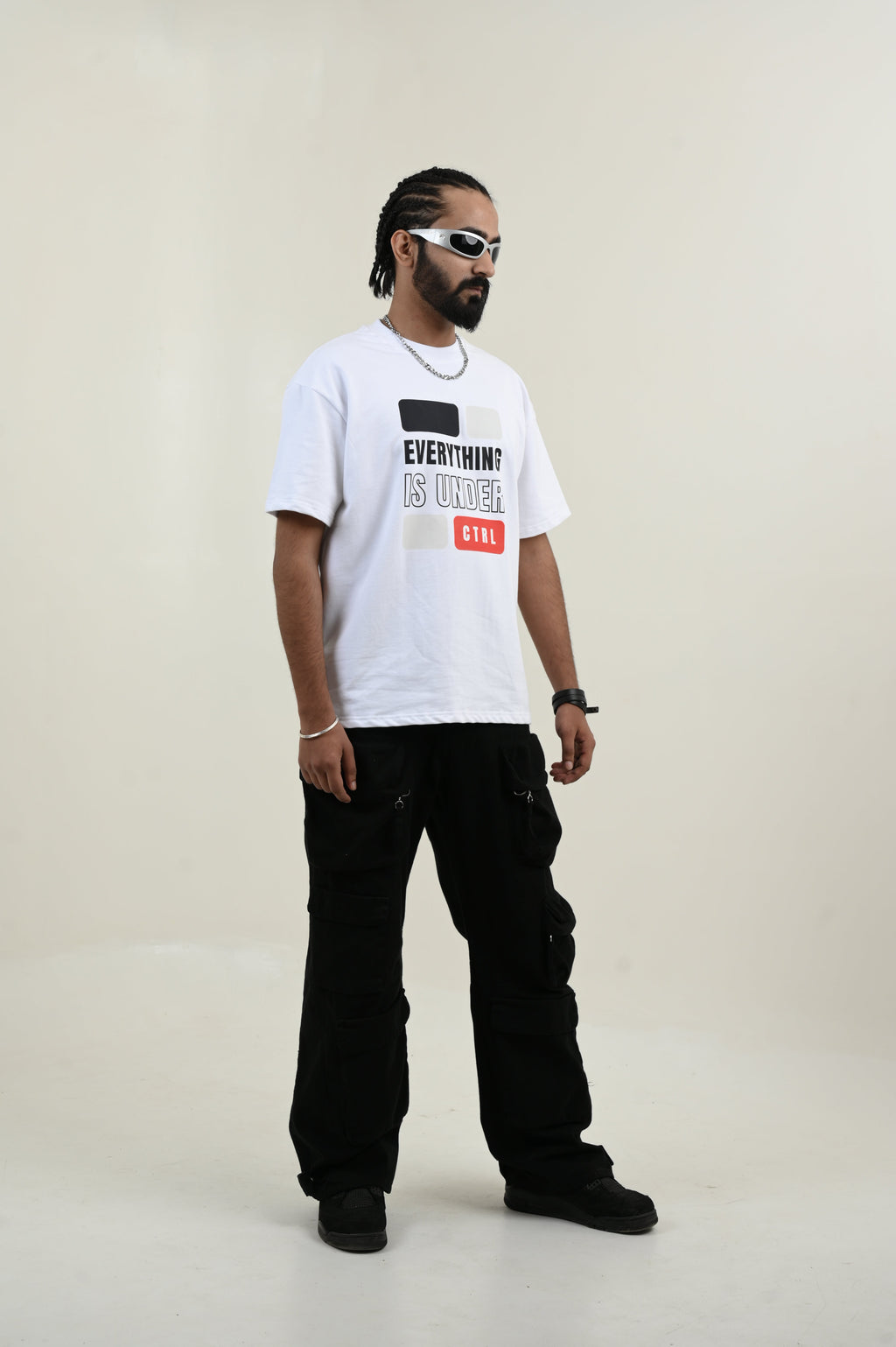 Under Control 100% Cotton Oversized White T-shirt at Kamakhyaa by Unfussy. This item is 100% cotton, Casual Wear, Organic, Oversized Fit, Printed, T-Shirts, Unfussy, Unisex, White, Womenswear