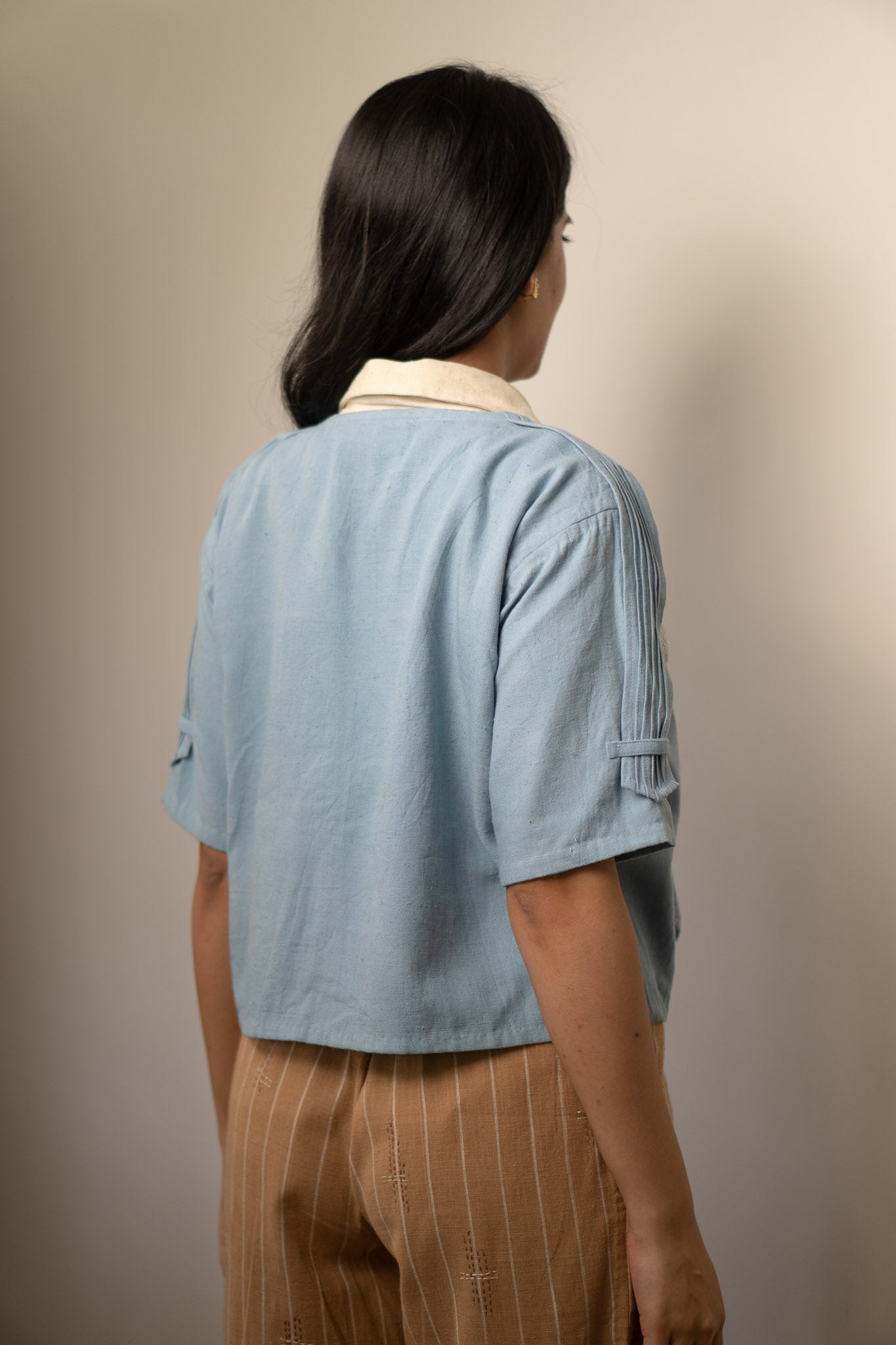 Unisex Cropped Half Sleeve Jacket at Kamakhyaa by Lafaani. This item is 100% pure cotton, Casual Wear, Jackets, Light Blue, Materiality, Menswear, Natural with azo free dyes, Organic, Regular Fit, Solids, Unisex