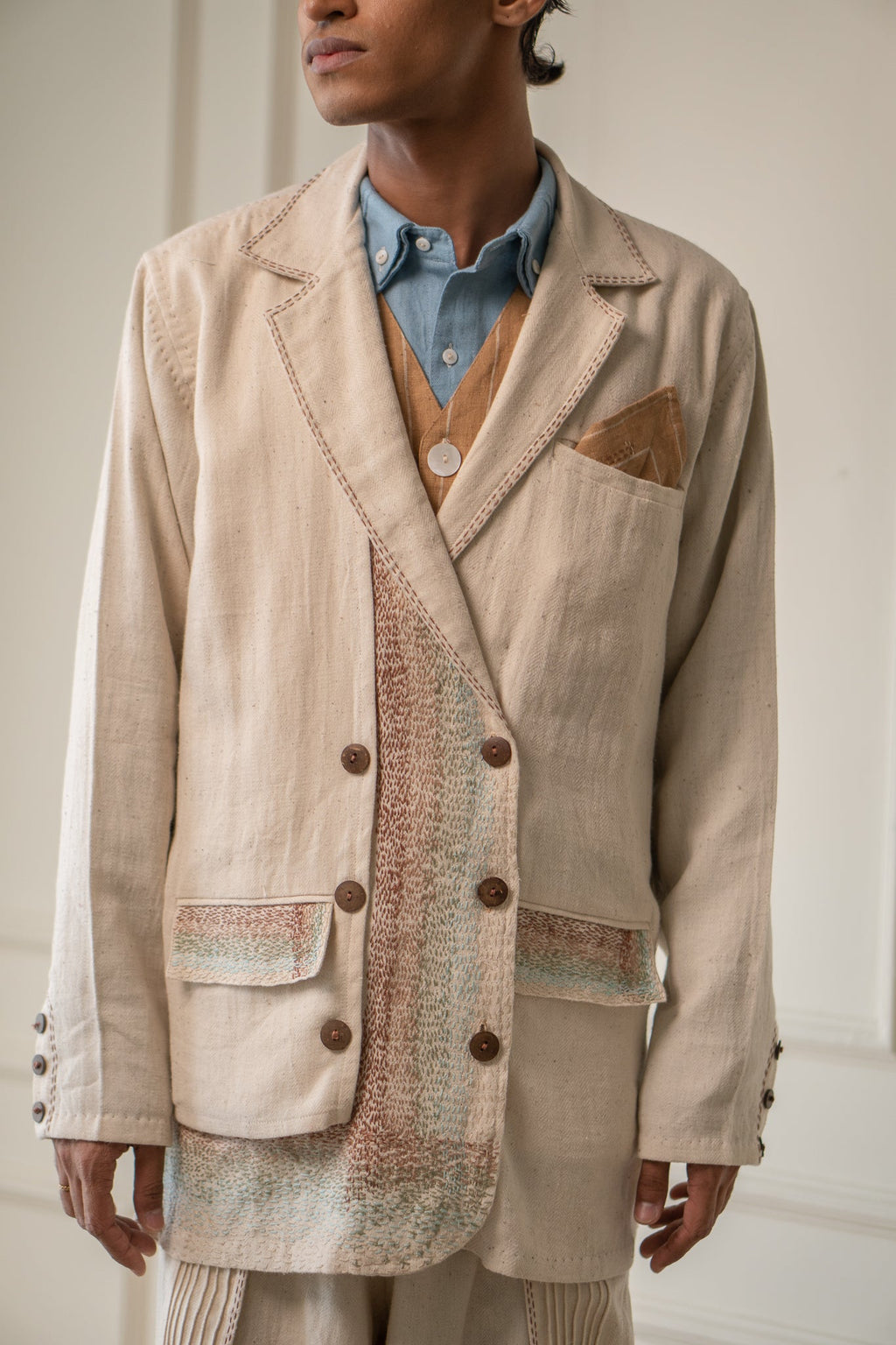 Unisex Double-Breasted Jacket at Kamakhyaa by Lafaani. This item is 100% pure cotton, Casual Wear, Jackets, Kora, Materiality, Menswear, Natural with azo free dyes, Organic, Regular Fit, Solids, Tops, Unbleached and Undyed, Unisex